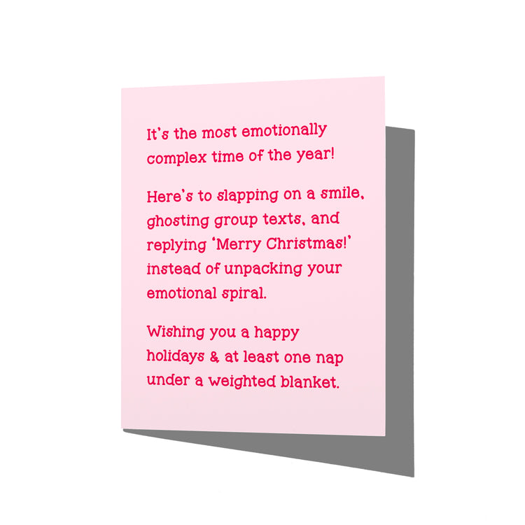Funny holiday card with witty emotional detachment humor message on front, blank inside.