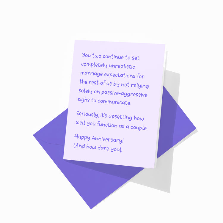 Funny anniversary greeting card with colorful envelope, functional couple design.