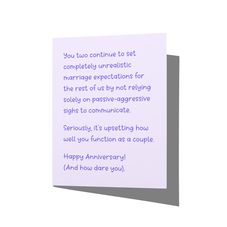 Funny anniversary card with snarky marriage humor message on front, blank inside.