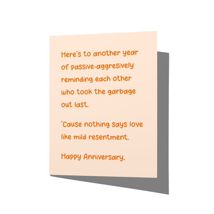 Funny anniversary card with marriage humor message on front, blank inside.