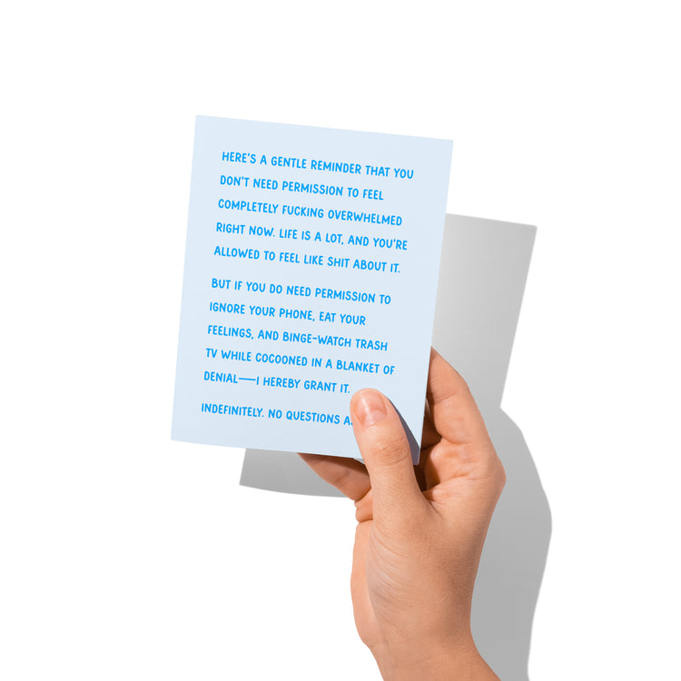 sympathy card held in hand, humorous permission-to-cocoon message visible.