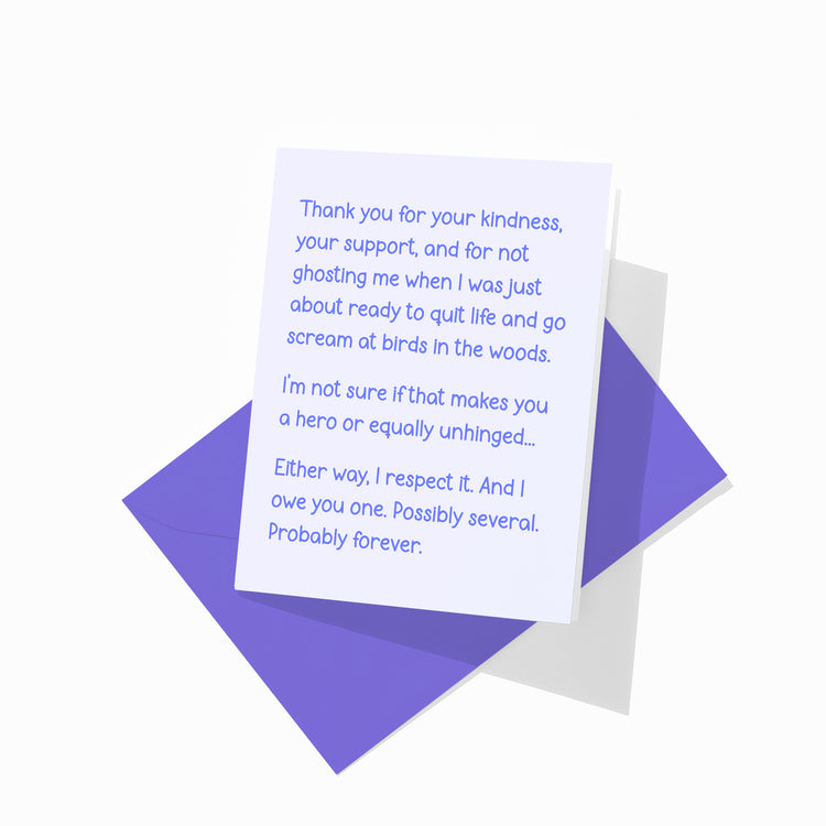 Thank you card and colorful envelope displayed flat.