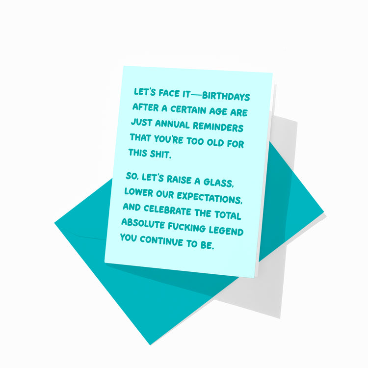 Funny birthday greeting card with colorful envelope, snarky adult humor design.
