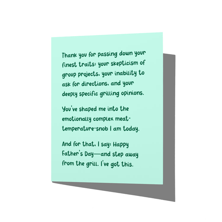 Funny Father’s Day card with witty grilling humor message on front, blank inside.