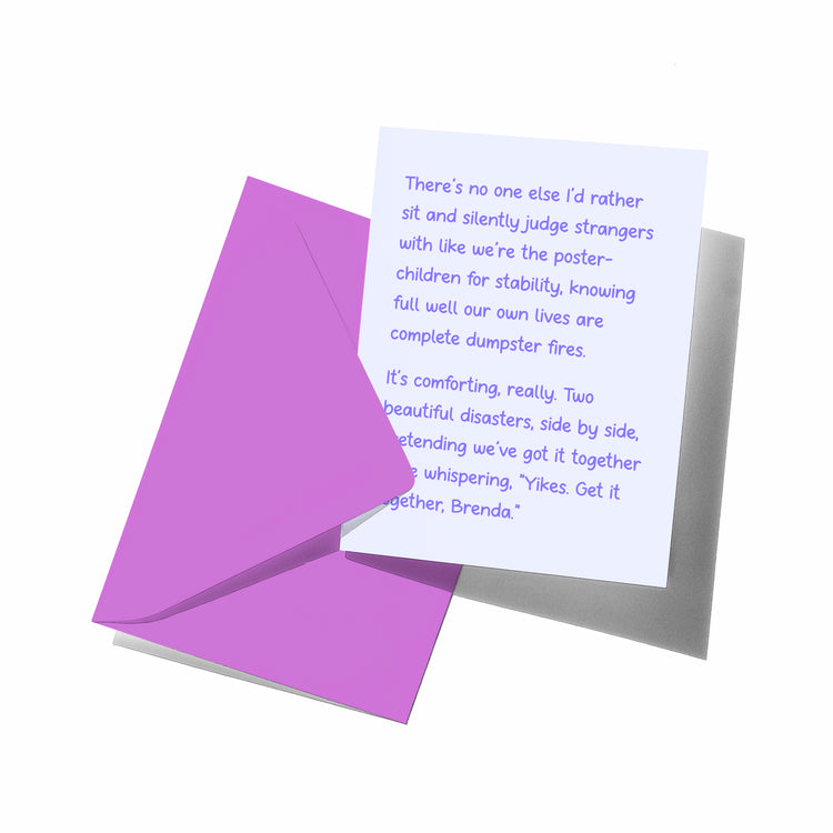 Greeting card with purple envelope on a white background