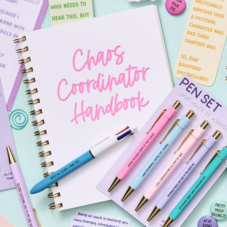 Funny letterpress notebook for multitaskers with bold pink text on white rigid cover.