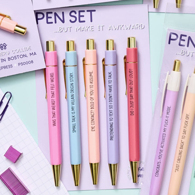 Funny pastel pens with awkward and sarcastic phrases, packaged on a backing card
