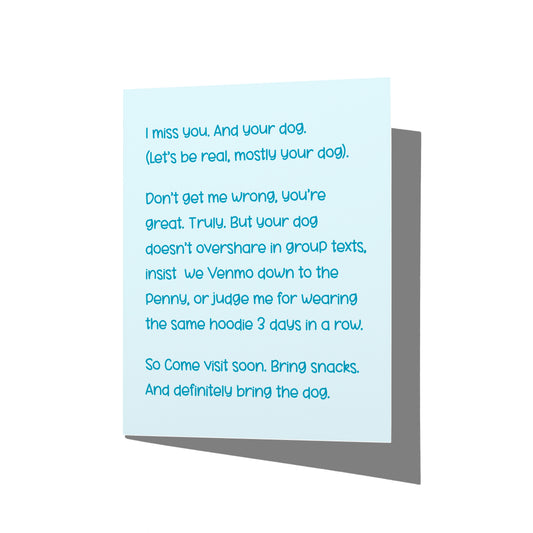 Funny friendship card with miss-you and dog humor message on front, blank inside.