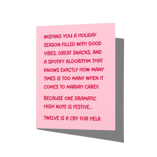Funny holiday card with witty Mariah Carey humor message on front, blank inside.