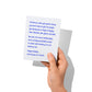 Funny holiday card held in hand, humorous snarky holiday message visible.