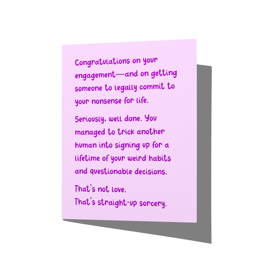Funny engagement card with snarky congratulations message on front, blank inside.