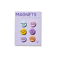 Set of six colorful snarky magnets on backing card with petty phrases