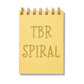 Yellow mini jotter with letterpress text “TBR Spiral” and gold spiral binding.
