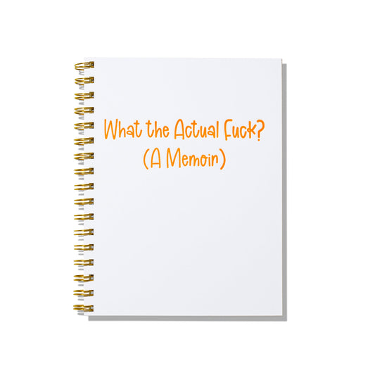 Large letterpress notebook with “What the Actual F**? (A Memoir)” in orange text on a white cover with gold spiral binding.*
