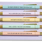 Profane pen set with five pastel ballpoint pens featuring funny swear word quotes on a backing card.
