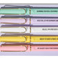 Pastel gel pens with gold accents and witty quotes about panic and anxiety, gift-ready stationery set.
