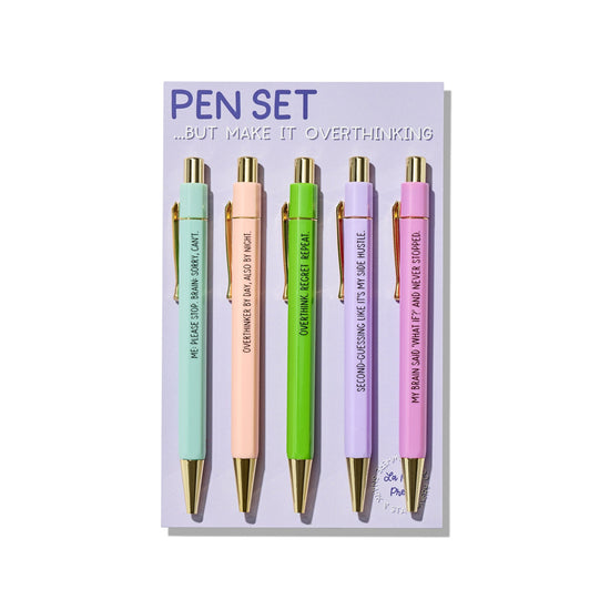Set of five pastel pens with gold accents, each printed with funny overthinking quotes, on branded backing card.