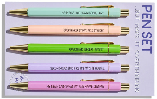 Funny pastel click pens with gold details and humorous overthinking quotes, packaged on backing card in cello sleeve.