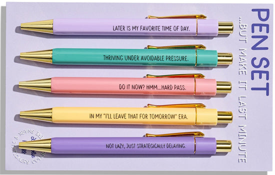 Close-up of five pastel click pens with gold details and humorous last-minute quotes, stationery gift for procrastinators.