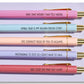 Awkward Pen Set with 5 pastel ballpoint pens and gold accents featuring funny introvert quotes
