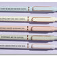 Bookish pen set of 5 ballpoint pens with funny reader quotes, displayed on a purple backing card with pastel pens and rose gold accents.
