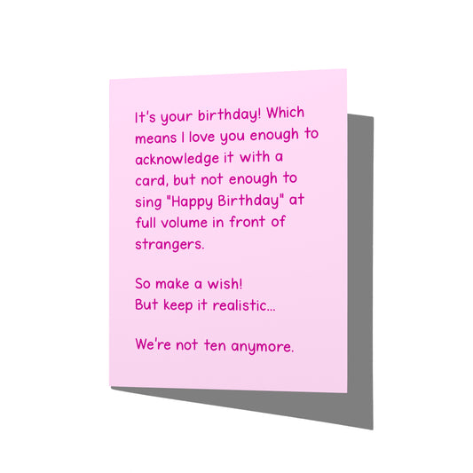 Funny birthday card with witty snarky humor message on front, blank inside.
