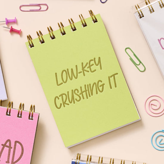 Funny mini notebook for notes, goals, and subtle wins.
