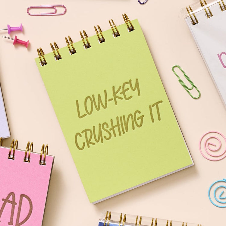 Funny mini notebook for notes, goals, and subtle wins.
