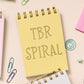 Funny handmade notebook for readers to track to-be-read lists.
