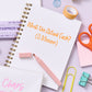Funny letterpress notebook with rigid matboard cover and bold orange text design.
