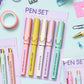 Funny gel pens with black ink and humorous stress-related phrases, packaged in a 5-pack set.
