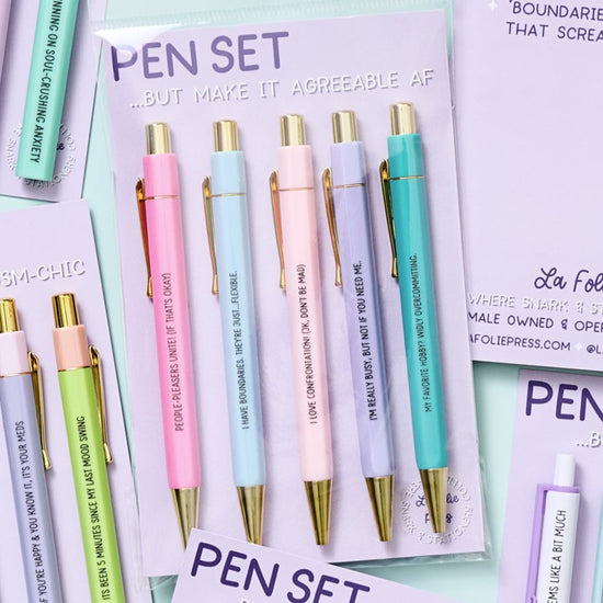People Pleasing pen set featuring pastel ballpoint pens with snarky phrases, black ink, stationery gift for agreeable overcommitters.