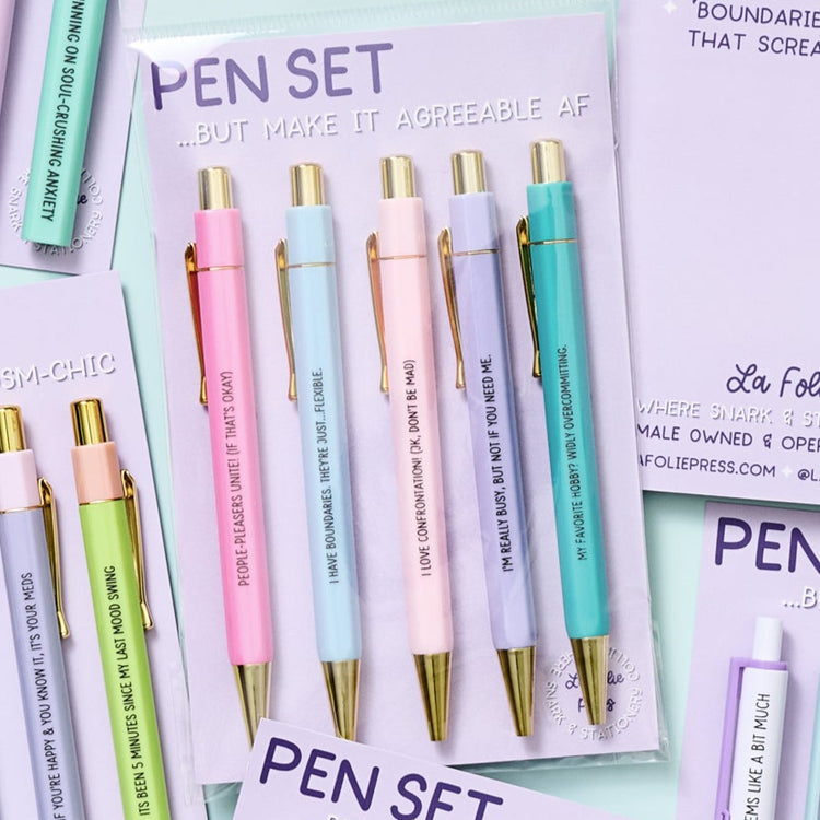 People Pleasing pen set featuring pastel ballpoint pens with snarky phrases, black ink, stationery gift for agreeable overcommitters.